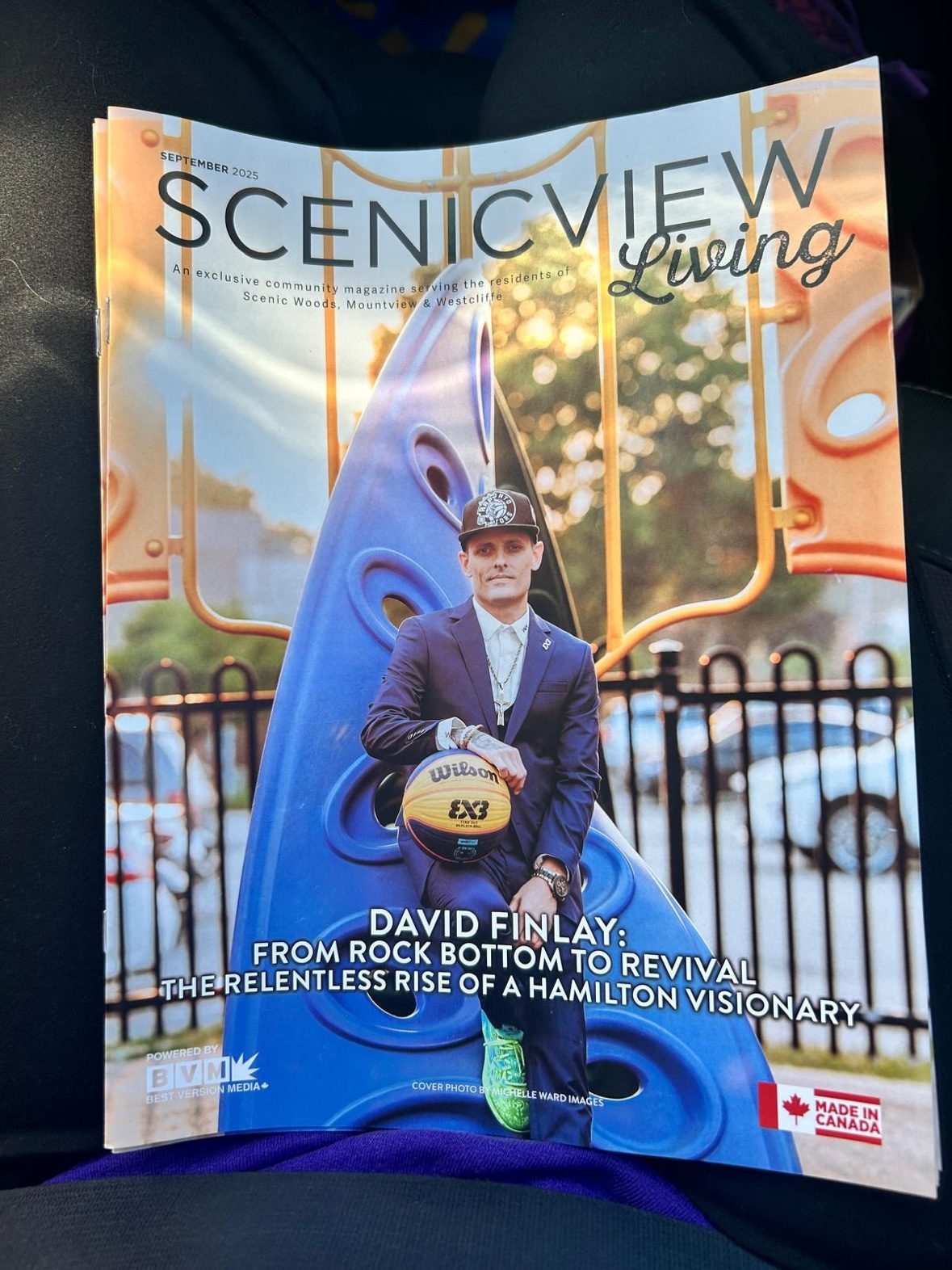 ScenicView Living magazine, September 2025 front cover featuring David Finlay in a suit holding a Wilson 3x3 basketball at a playground